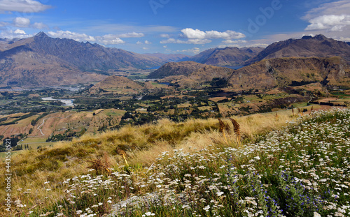 spectacular view  across speargrass flat lower shotover  and dalefield to lake hayes   from coronet  peak. near queenstown on the south island of new zealand