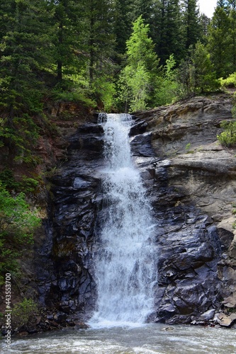 picturesque waterfall and crystal river in summer  in the forests of the rocky moutains near redstone, colorado  © Nina