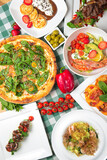 Italian cuisine concept top view Italian dishes. Summer strawberry menu.