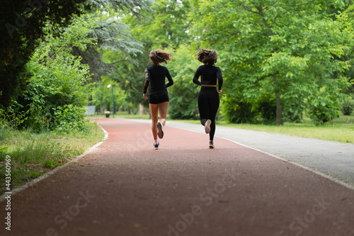 Fototapeta Naklejka Na Ścianę i Meble -  Running on the red track