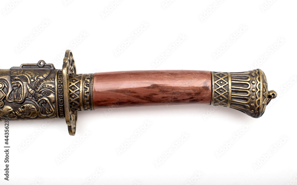 Beautiful patterns on the katana saber on the handle and protective case, close-up Beautiful patterns on the katana saber on the handle and protective case, close-up