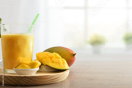 Healthy mango juice with milk and portions of fruit kitchen