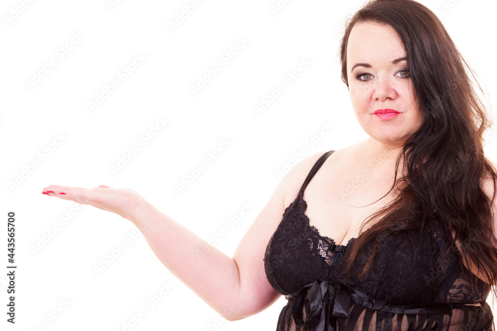 Woman plus size in lingerie holds open hand Woman plus size in lingerie holds open hand