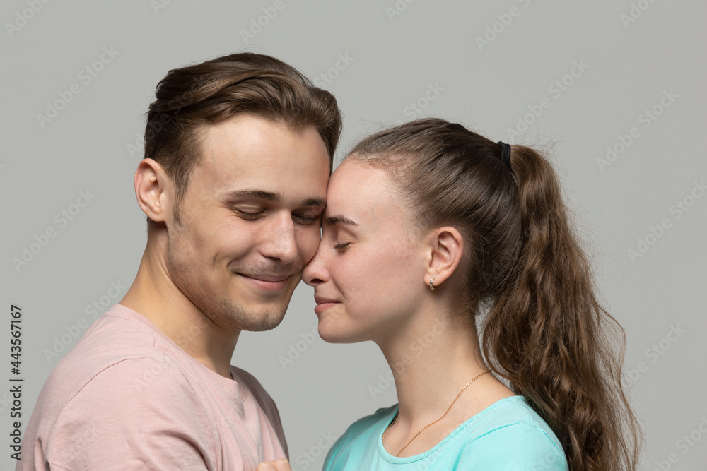 Studio portrait affectionate, tender young couple
Studio portrait affectionate, tender young couple