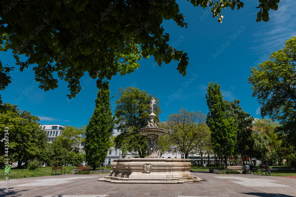Wide panorama of hessenpark, a beautiful park with a fountain in
