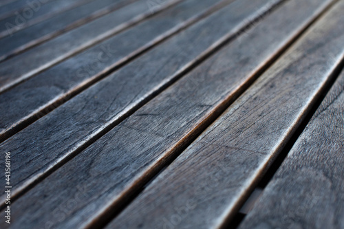 Close up of grey wooden planks. Diagonal lines. Copy space.