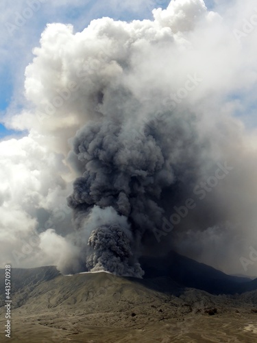 Mt. Bromo volcano actively erupts in bromo tengger semeru national park on a sunny day in east java, Indonesia © Nina