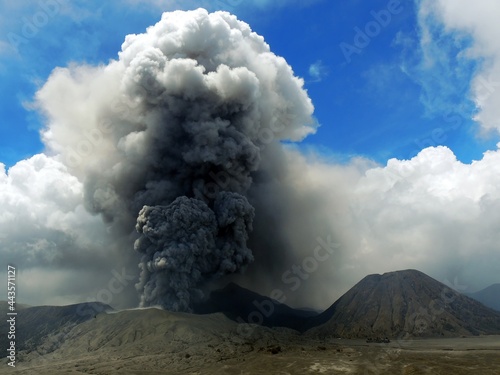 Mt. Bromo volcano actively erupts in bromo tengger semeru national park on a sunny day in east java, Indonesia