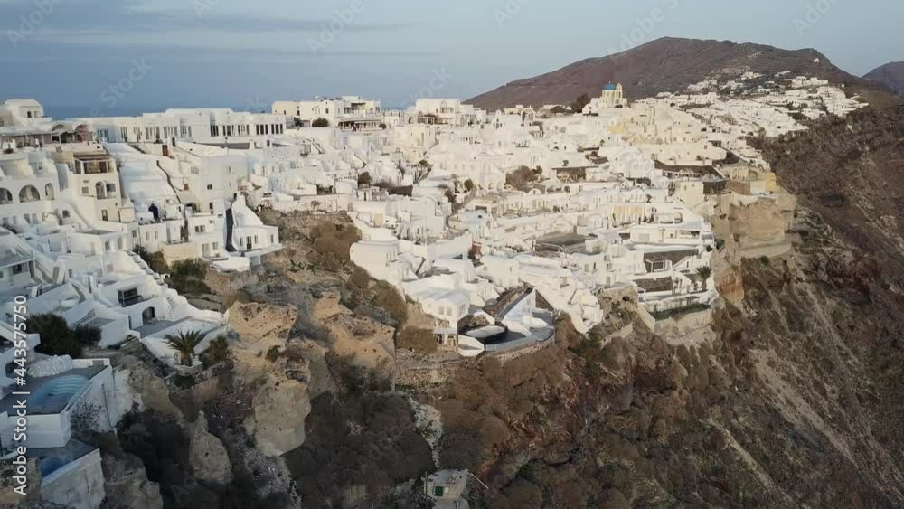 Aerial drone shot of Oia Santorini Greece at sunset off season, 4K Aerial drone shot of Oia Santorini Greece at sunset off season, 4K