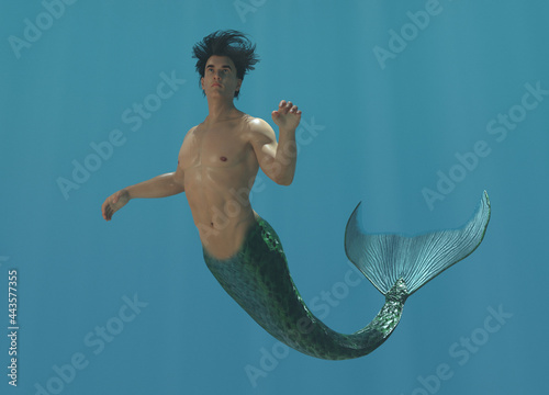 3D render, a merman creature is swimming under the sea  photo