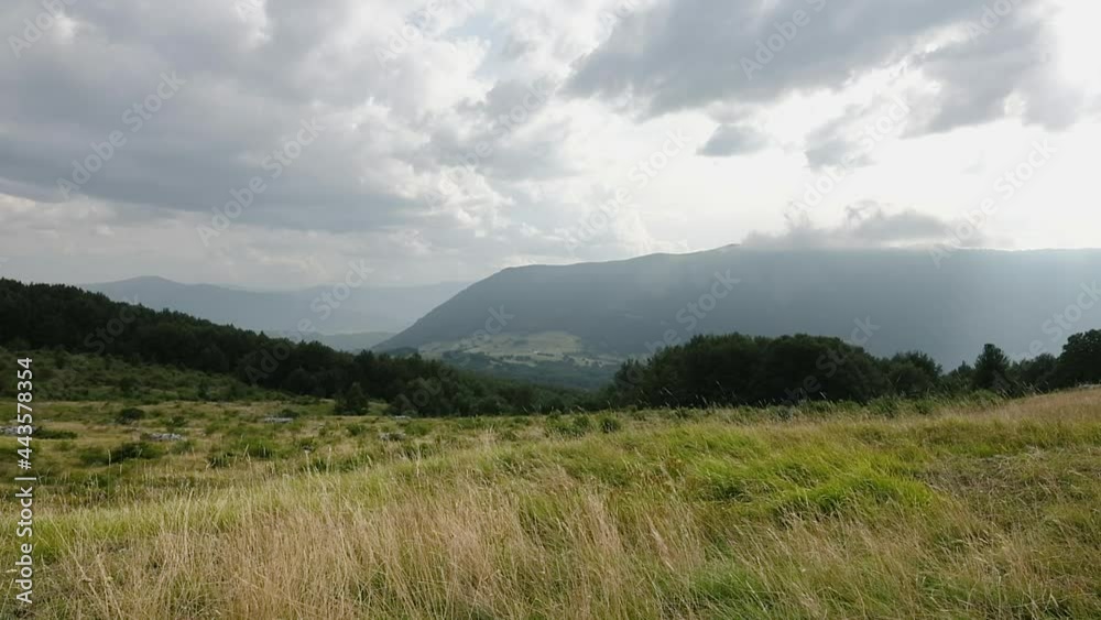 Majella National Park with a view of the Abruzzo Apennines on a sunny day with wind and clouds. Wild pastures located in one of the seven nature reserves of the Majella National Park Majella National Park with a view of the Abruzzo Apennines on a sunny day with wind and clouds. Wild pastures located in one of the seven nature reserves of the Majella National Park