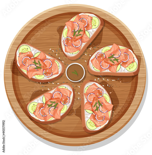 Smoked salmon bruschetta on a wooden round plate isolated