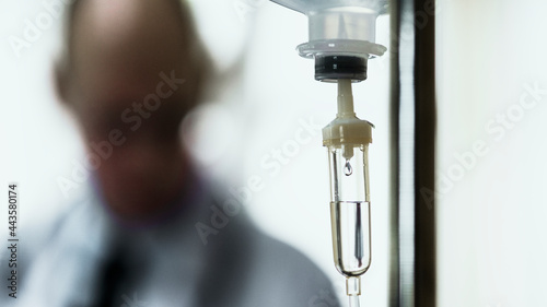 Closeup of IV drip chamber for coronavirus patient