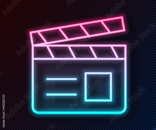 Glowing neon line Movie clapper icon isolated on black background. Film clapper board. Clapperboard sign. Cinema production or media industry. Vector