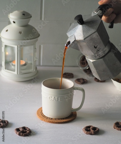 coffee maker and chocolate cookies