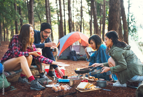 Friends camping in the forest