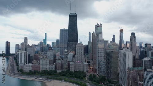 Dark and grey storm clouds roll over Gotham city Chicago Illliinois photo