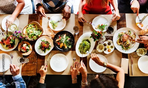 Fototapeta samoprzylepna Aerial view of a table full of food