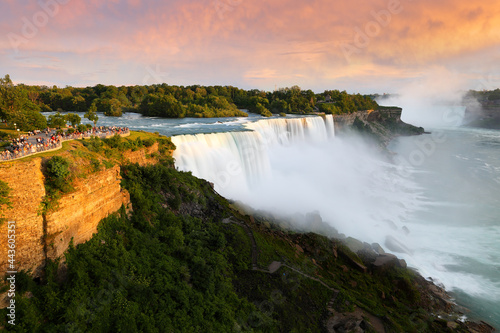 Overview of Niagara Falls with beautiful sunset  Niagara Falls  is a group of three waterfalls at the southern end of Niagara Gorge  in New York State USA