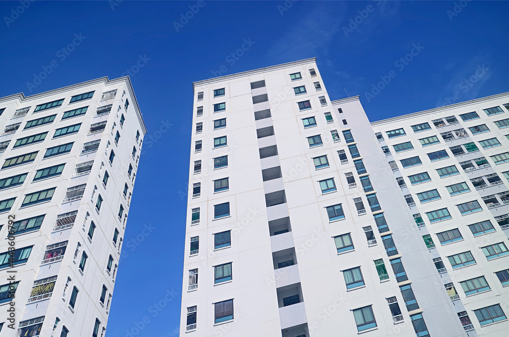 Low Angle View of Modern Buildings against Vivid Blue Sunny Sky