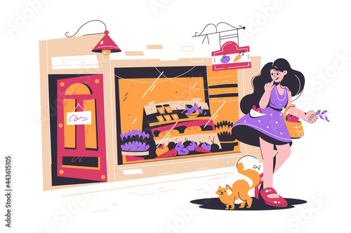 Cute girl shopping in small street shop