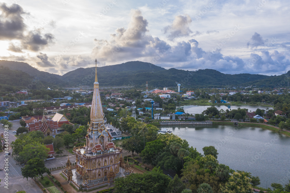 .aerial panorama view scenery sunset above Chalong pagoda in Phuket province..Chalong temple is the one popular landmark in phuket.colorful cloud scape sky sunset.travel culture concept.