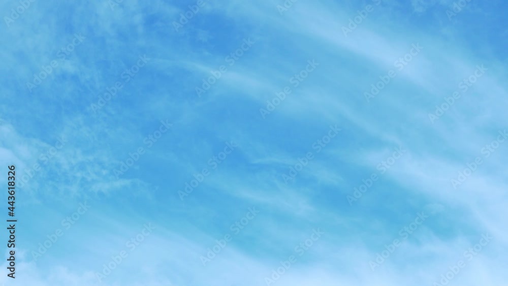 A Clear Blue Sky and Light Gentle White Clouds, A Beautiful Lapse Time. Background of Feathery White Clouds in the Azure Sky. Sunny Weather, Air, Atmosphere, Altitude, Flight, Space Nature 4K, Heaven A Clear Blue Sky and Light Gentle White Clouds, A Beautiful Lapse Time. Background of Feathery White Clouds in the Azure Sky. Sunny Weather, Air, Atmosphere, Altitude, Flight, Space Nature 4K, Heaven