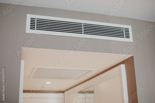 Conditioner air vent grill on the wall.
