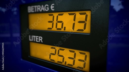 German fuel dispenser display. Real-time fueling process with slow zoom-in motion.