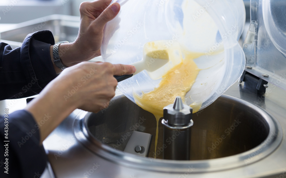 pouring the mixture into ice cream machine