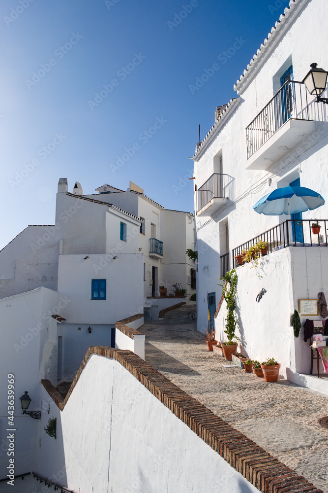Beautiful Frigiliana village in southern Spain. Traditional Spanish mountain town.  Whitewashed town houses in the old Moorish quarter.  Vertical shot.