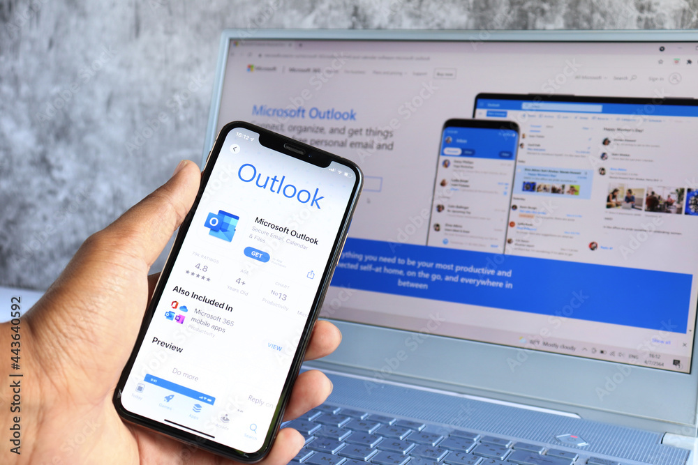 Microsoft Outlook On Computer Screen And Microsoft Outlook Logo On Microsoft Outlook On Computer Screen And Microsoft Outlook Logo On
