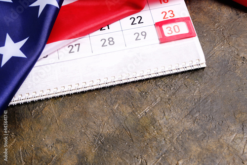 Фотография Flag United States America with calendar marked on thirtieth day Memorial Day