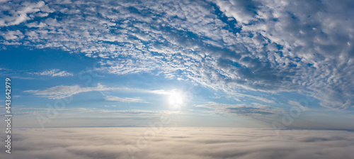 Fototapeta Naklejka Na Ścianę i Meble -  Sunrise over the clouds view from the drone