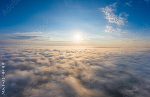 Sunrise over the clouds view from the drone