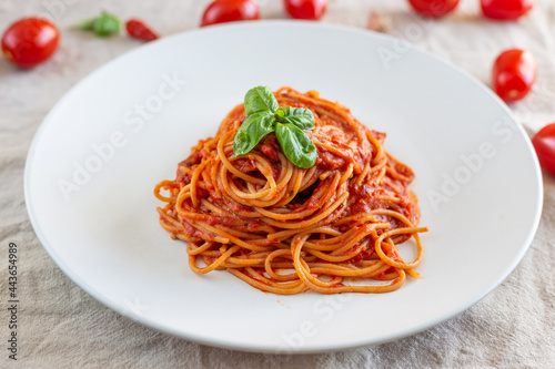 Italian spaghetti with tomato sauce, basil and extra virgin olive oil