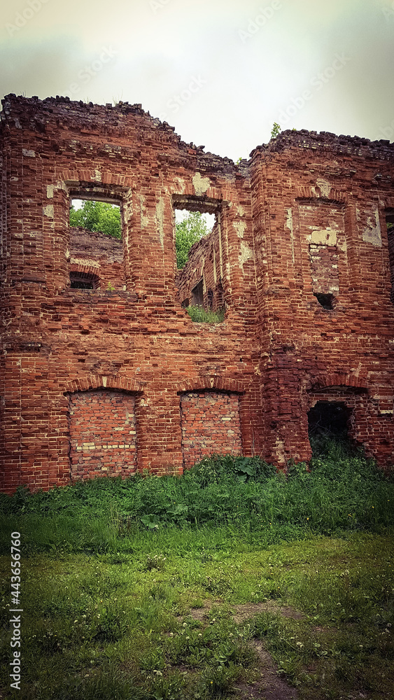 ancient ruins. the old red brick building is falling apart