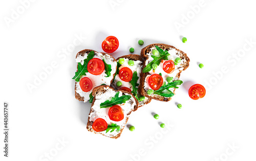 Bruschetta with cream cheese and vegetables isolated on a white background. Toasts isolated. Sandwich isolated. Sandwich with vegetables and cheese.
