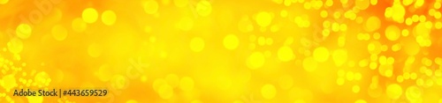 abstract gold, yellow background with bokeh lights 
