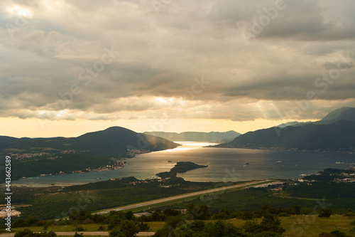 View of the Tivat Bay and the airport runway. Sunset in the Tivat Bay