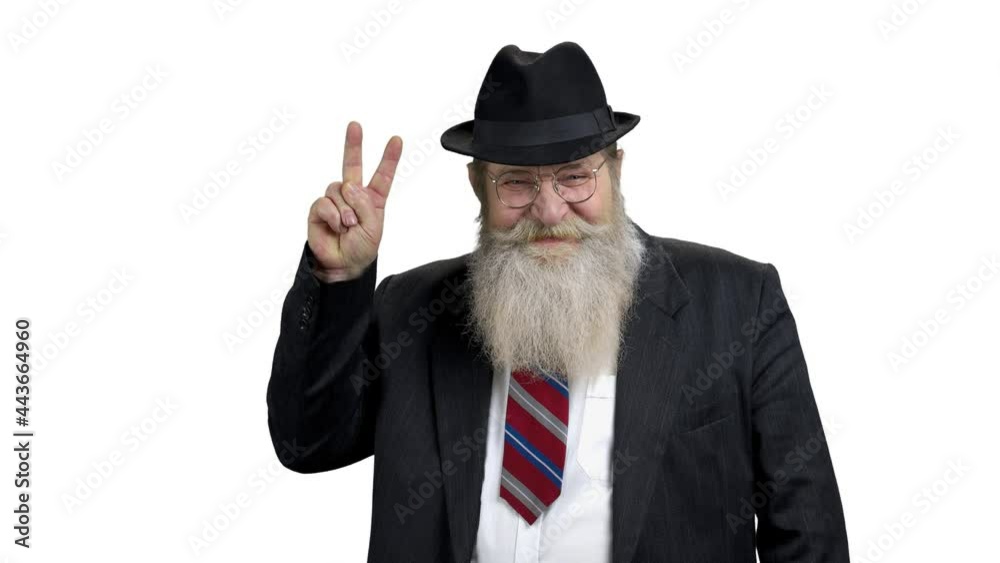 Happy senior man showing victory sign. Happy senior man showing victory sign.