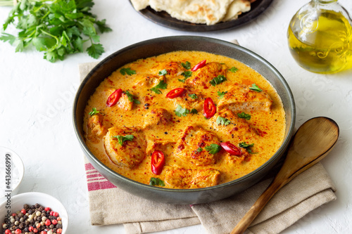 Chicken tikka masala curry with herbs and peppers. Indian food. National cuisine.