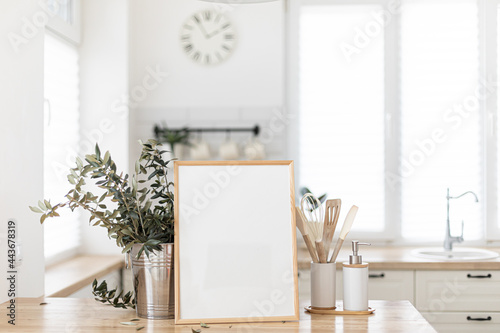 Mock up frame in kitchen interior background. Scandinavian home design. © Kotkoa