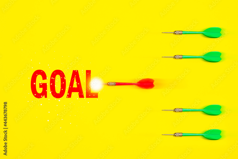 A red dart was rapidly rushing towards the target. which has 4 slower green darts. Concept about speed to reach business goals A red dart was rapidly rushing towards the target. which has 4 slower green darts. Concept about speed to reach business goals