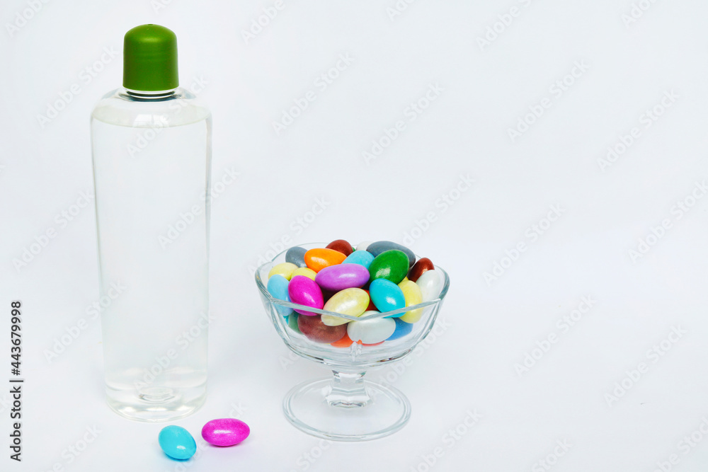 Feast Concept, Traditional Turkish Ramadan sweet sugar in glass bowl and cologne bottle Feast Concept, Traditional Turkish Ramadan sweet sugar in glass bowl and cologne bottle