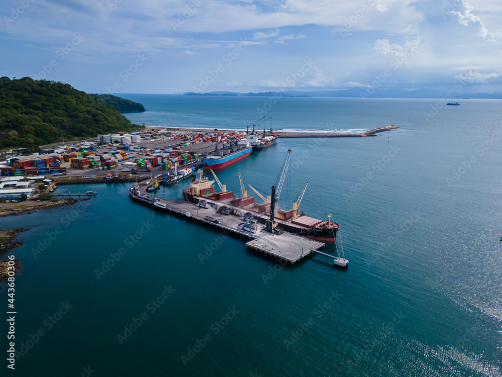 Beautiful aerial view of the Caldera Port in Puntarenas Costa Rica, full with cargo ships