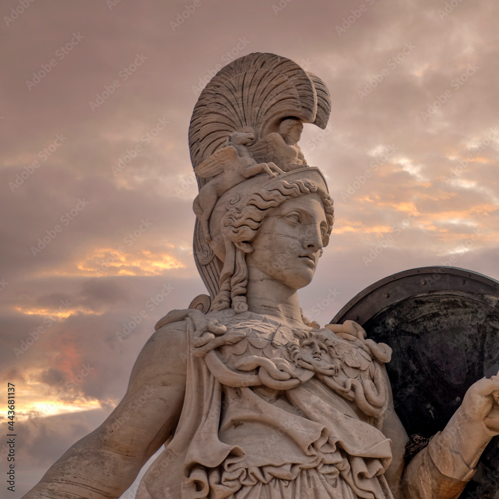 Athena ancient Greek goddess statue and impressive sky Photos | Adobe Stock