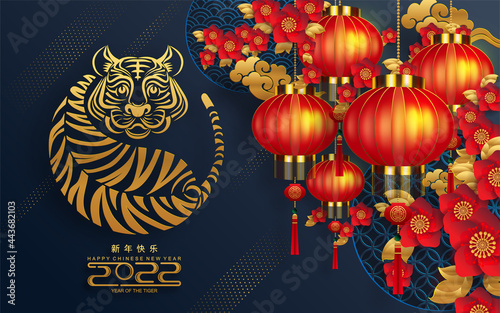 Chinese new year 2022 year of the tiger red and gold flower and asian elements paper cut with craft style on background.( translation : chinese new year 2022, year of tiger )