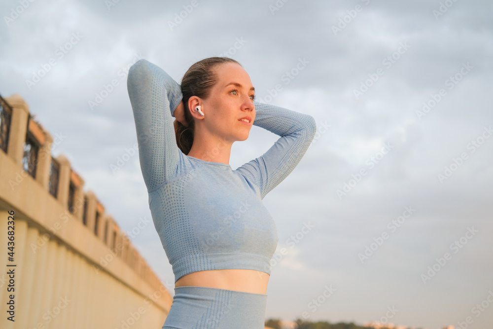 Young fitness woman finish running in the city Young fitness woman finish running in the city