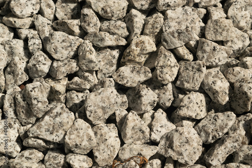 Diorite Igneous Stone Texture Background, Gray Granite Stones photo